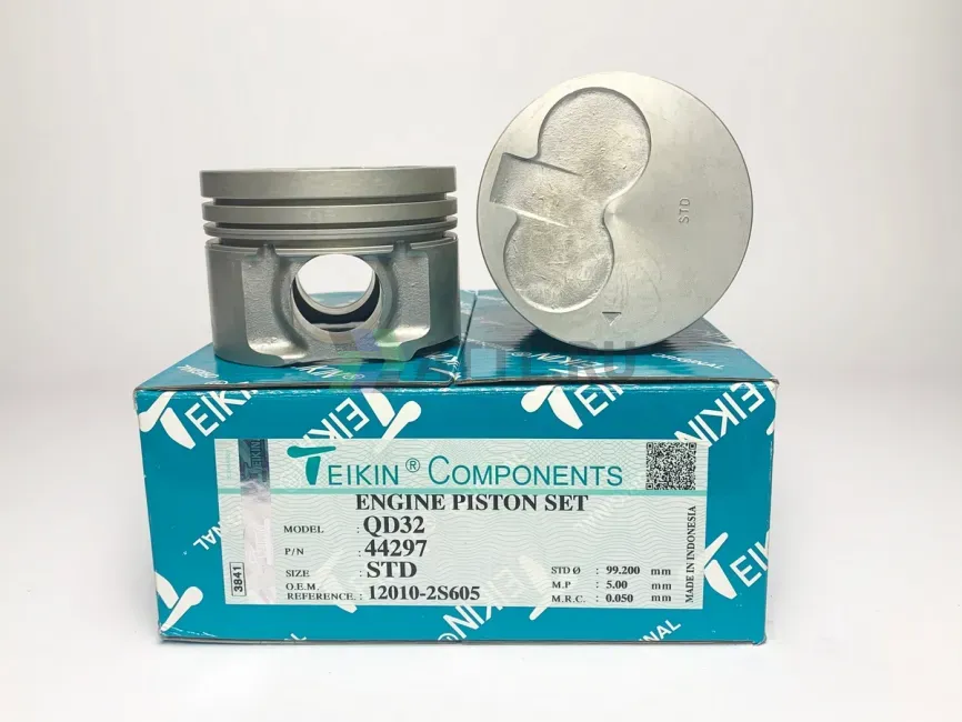 Комплект поршней QD32 фото 1